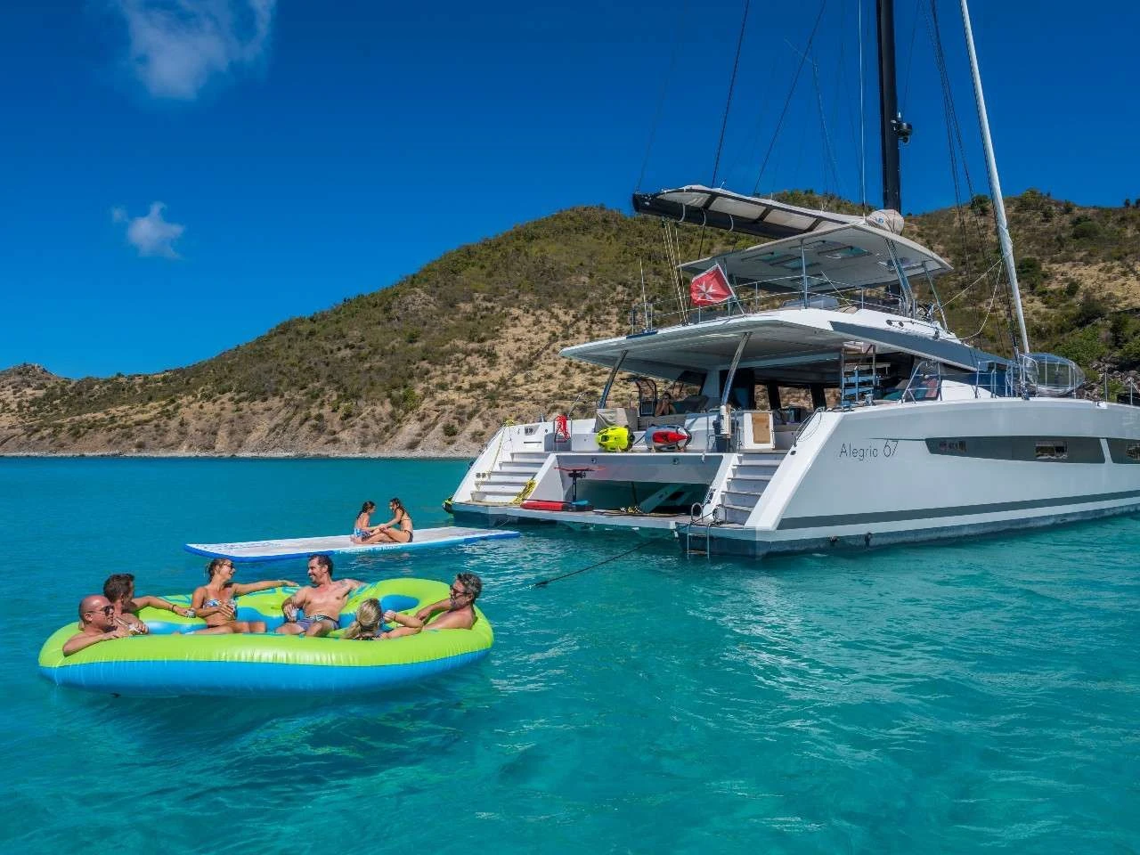 Fountaine Pajot Alegria 67 AZURE – at anchor with water toys