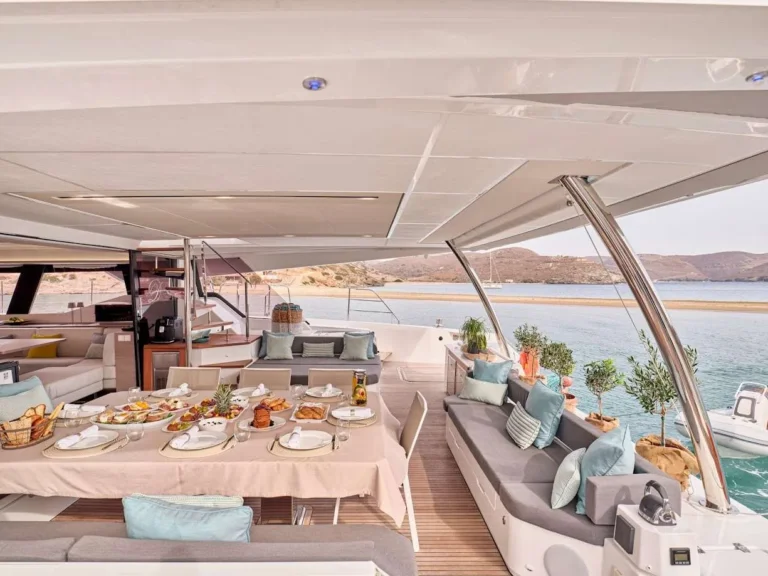 Alegria 67 DOLLY – Aft deck dining table set for breakfast