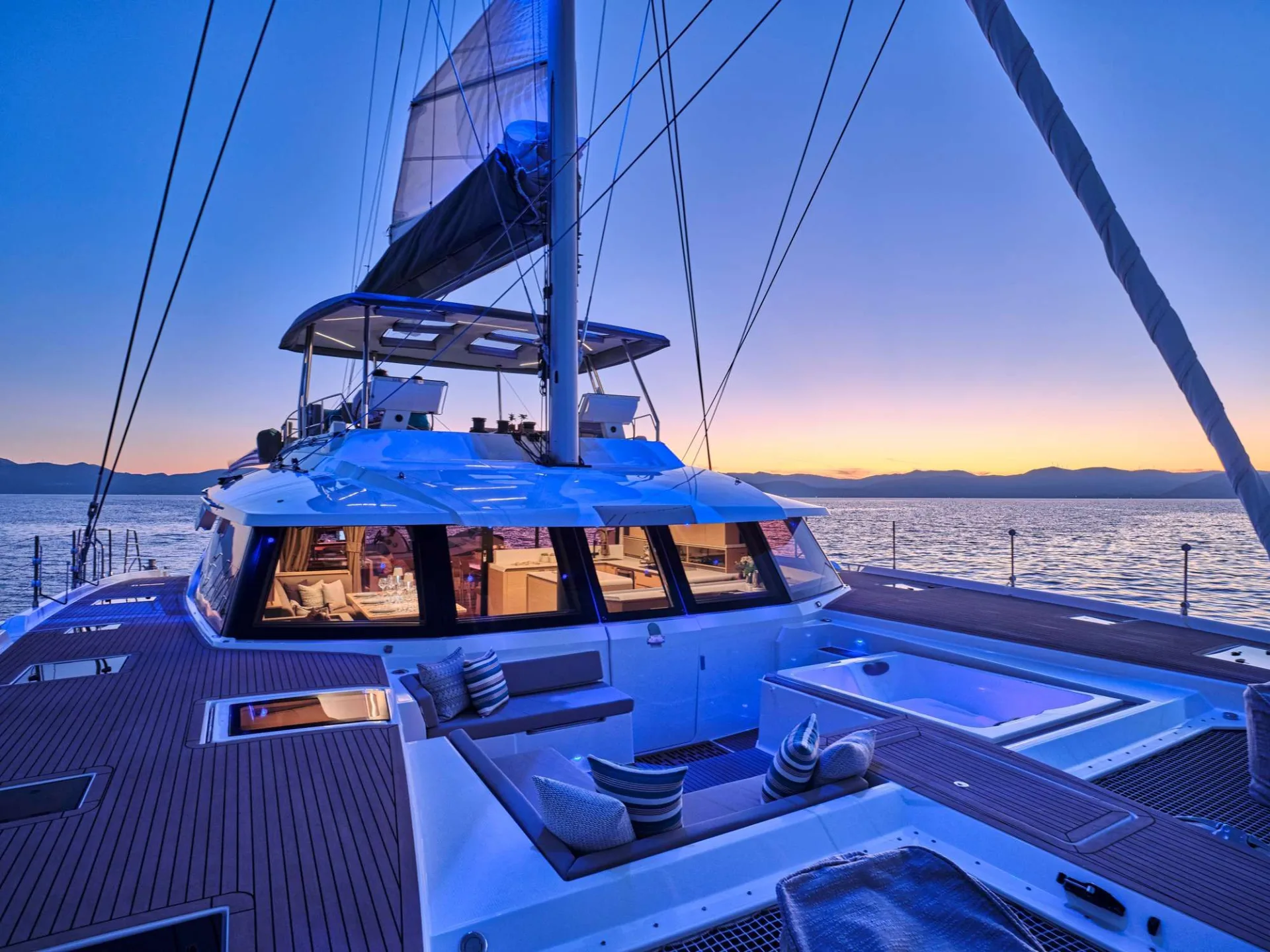 Fountaine Pajot Alegria 67 SUNMOON – Flybridge and Jacuzzi at dusk