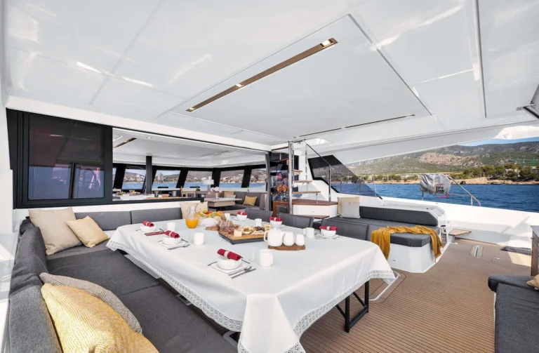 Fountaine Pajot 67 NEOW – Aft cockpit dining