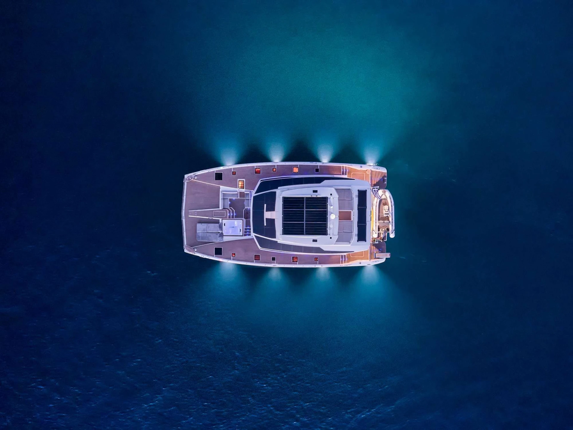 Fountaine Pajot Power 67 ALENA – Aerial view at night