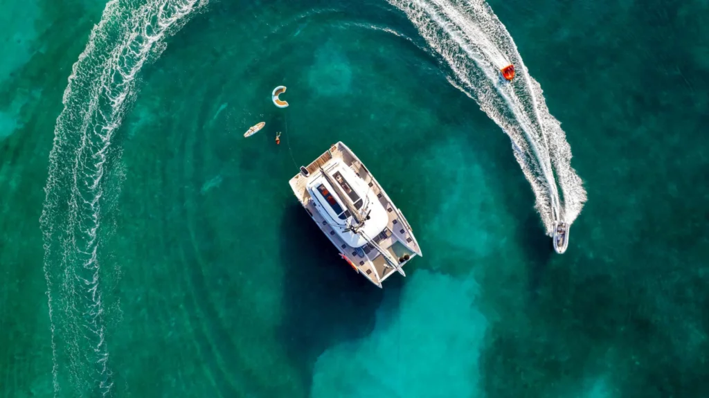 Lagoon 65 JUSTIFIED HORIZONS – Aerial view with water toys