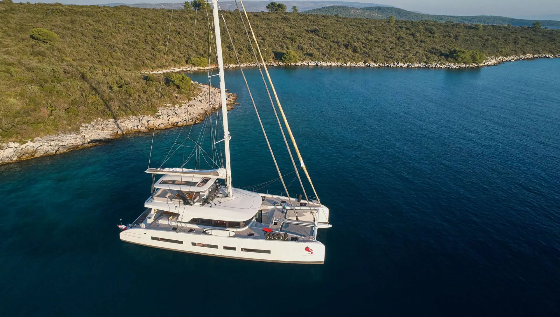 Lagoon 77 ADRIATIC DRAGON – Aerial view at anchor