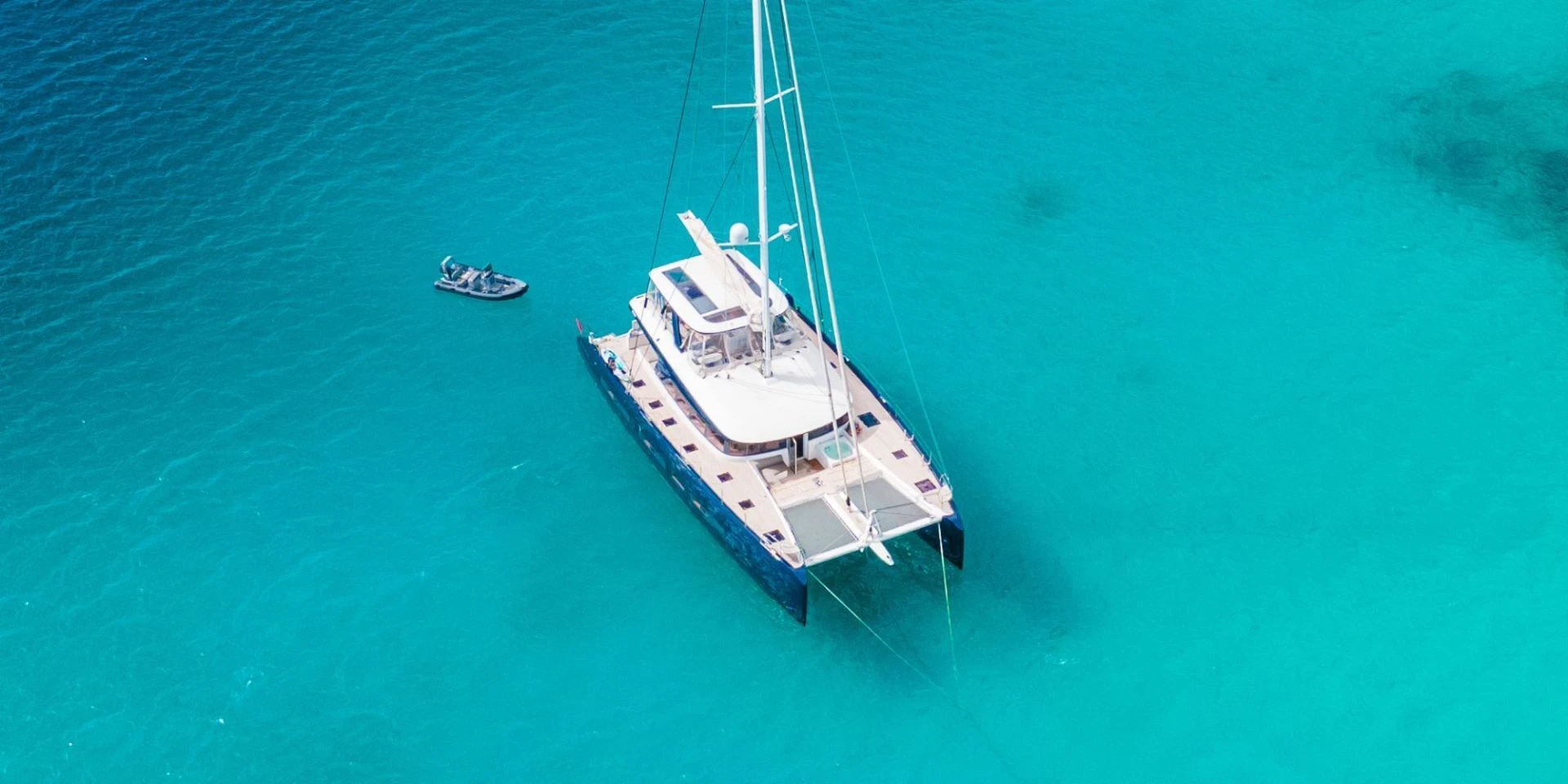 Lagoon Seventy 7 MANE ET NOCTE – aerial view with tender