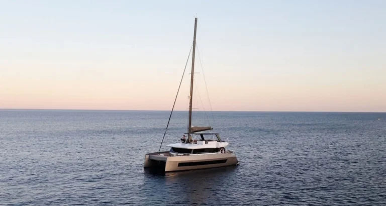 Moon 60 MOONLIGHT – At anchor at dusk