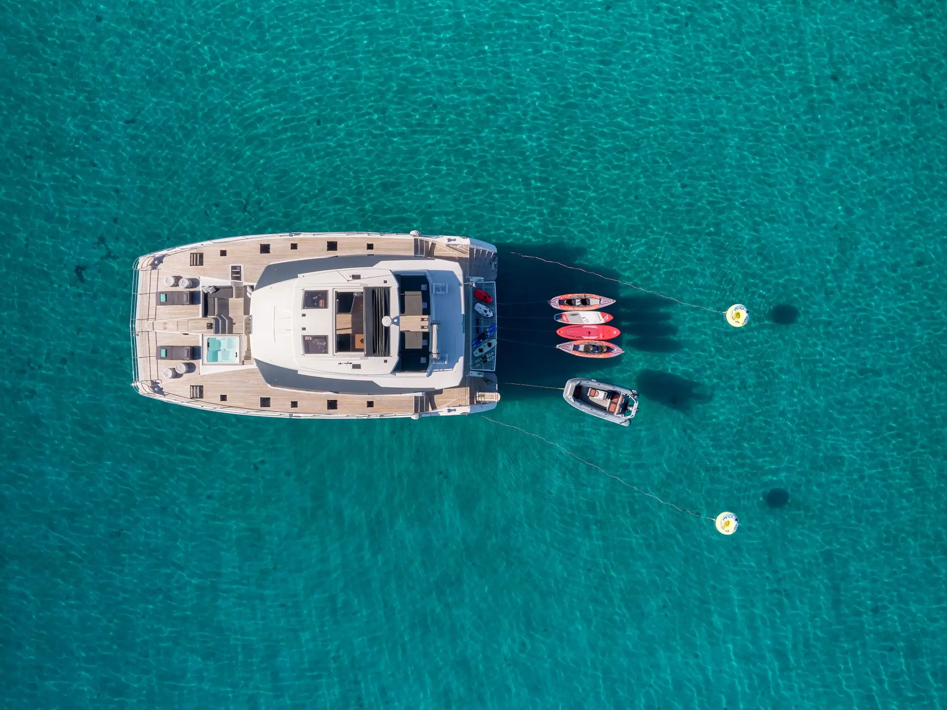 Power 67 CHRISTAL MIO – At anchor, aerial view