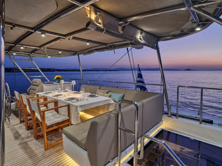 Sunreef 50 ADARA – Flybridge dining at dusk
