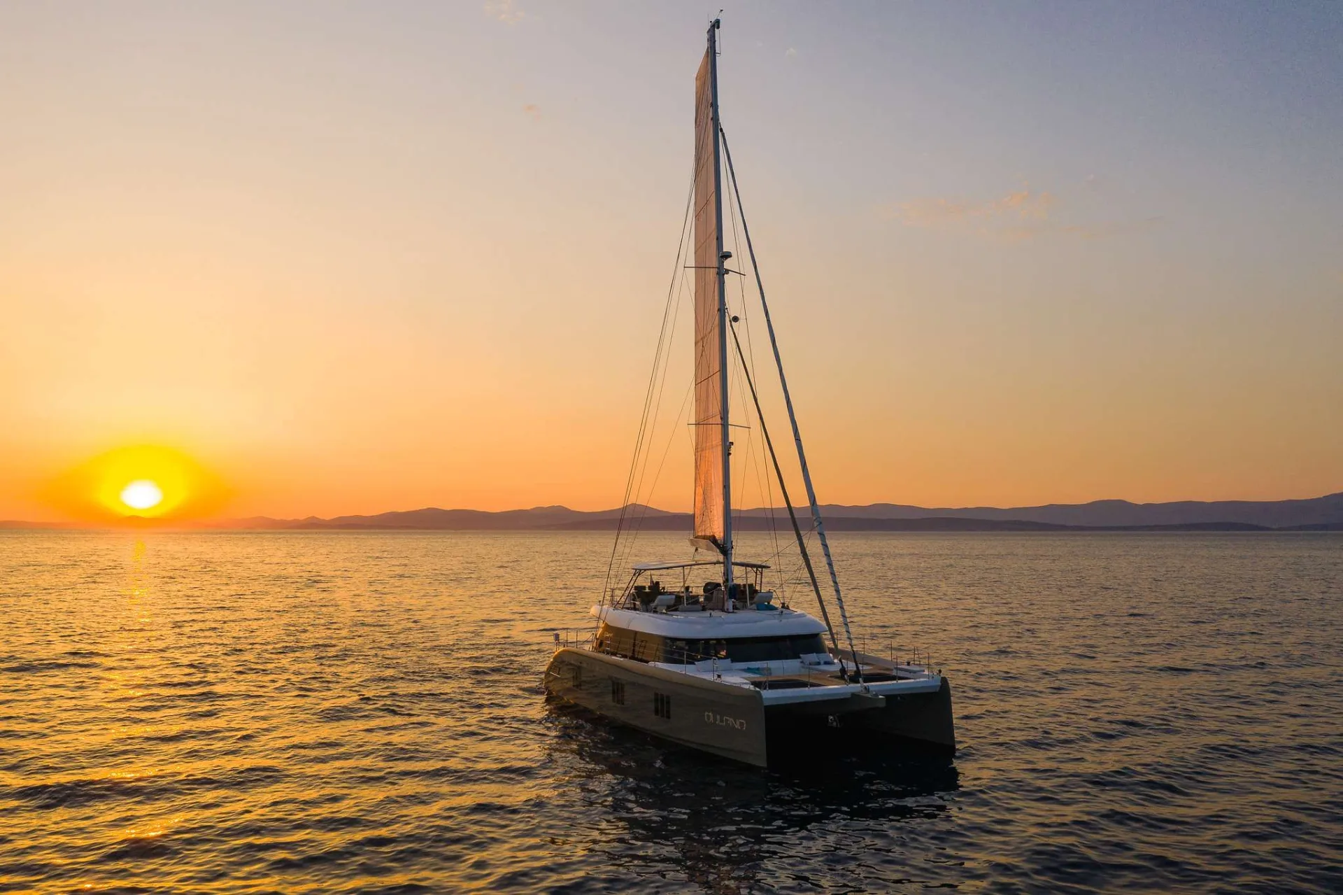 Sunreef 60 VULPINO – sailing at sunset