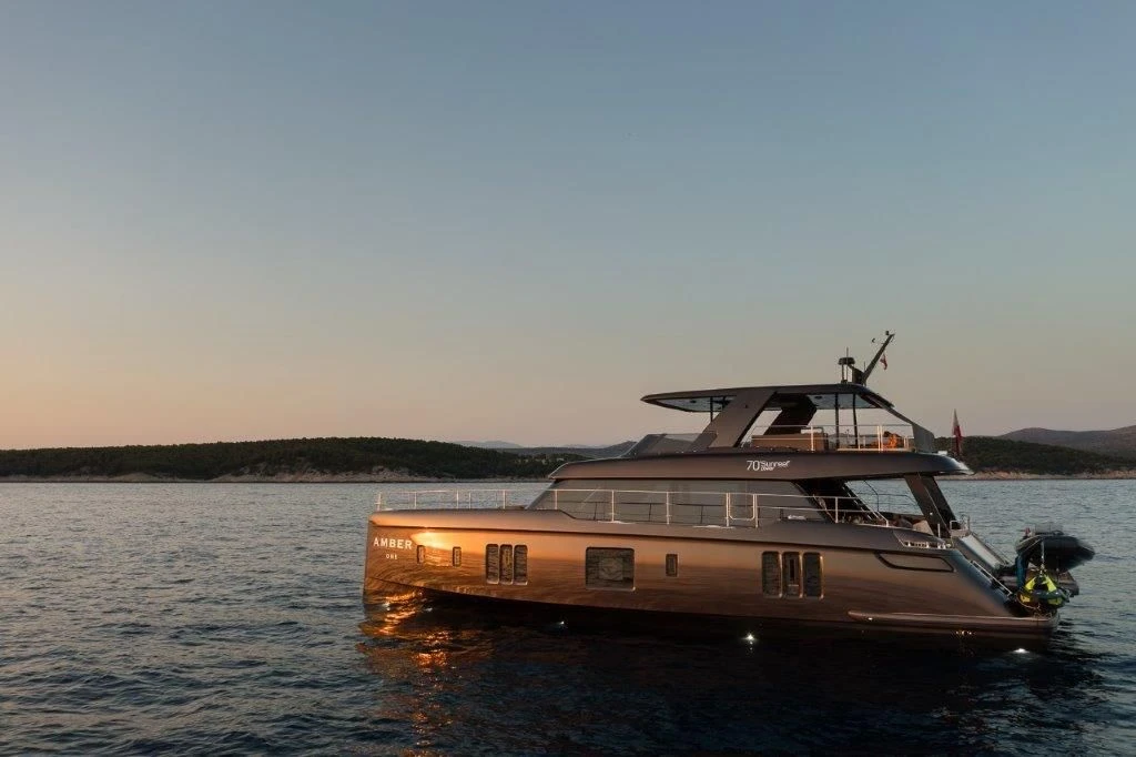 Sunreef 70 Power AMBER ONE – cruising at dusk