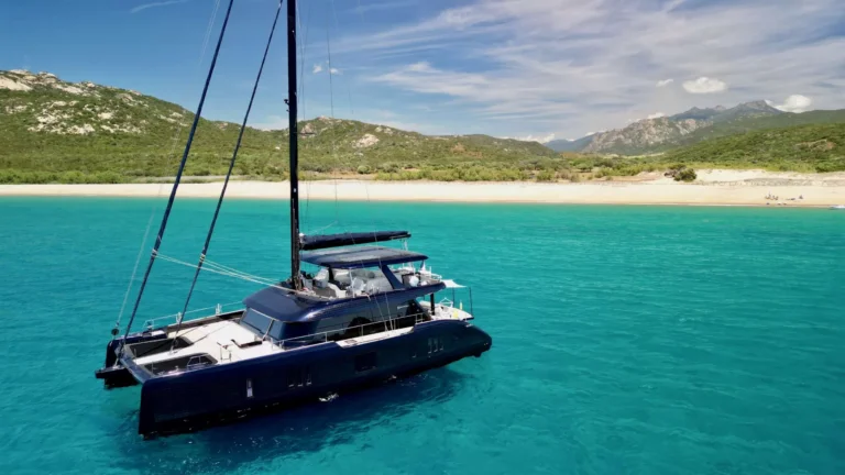 Sunreef 77 ONE PLANET – ONE PLANET at anchor off a white-sand beach