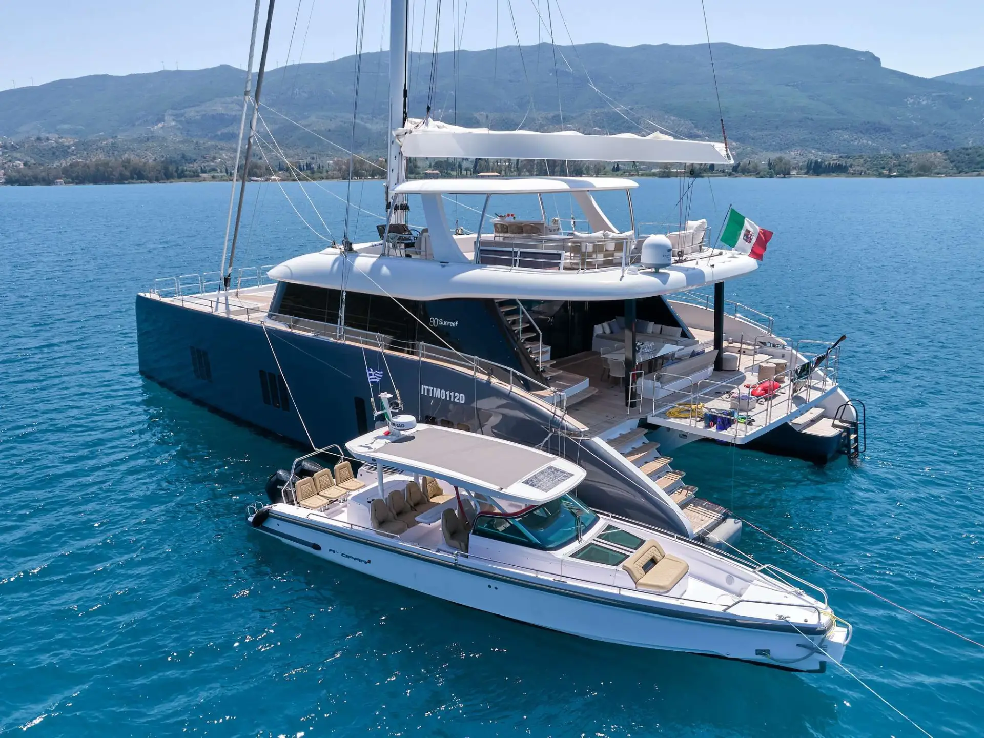 Sunreef 80 GENNY – At anchor with chase boat
