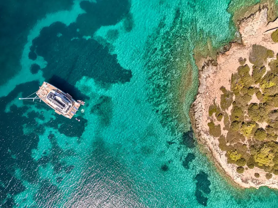 Thira 80 AD ASTRA – Aerial view at anchor