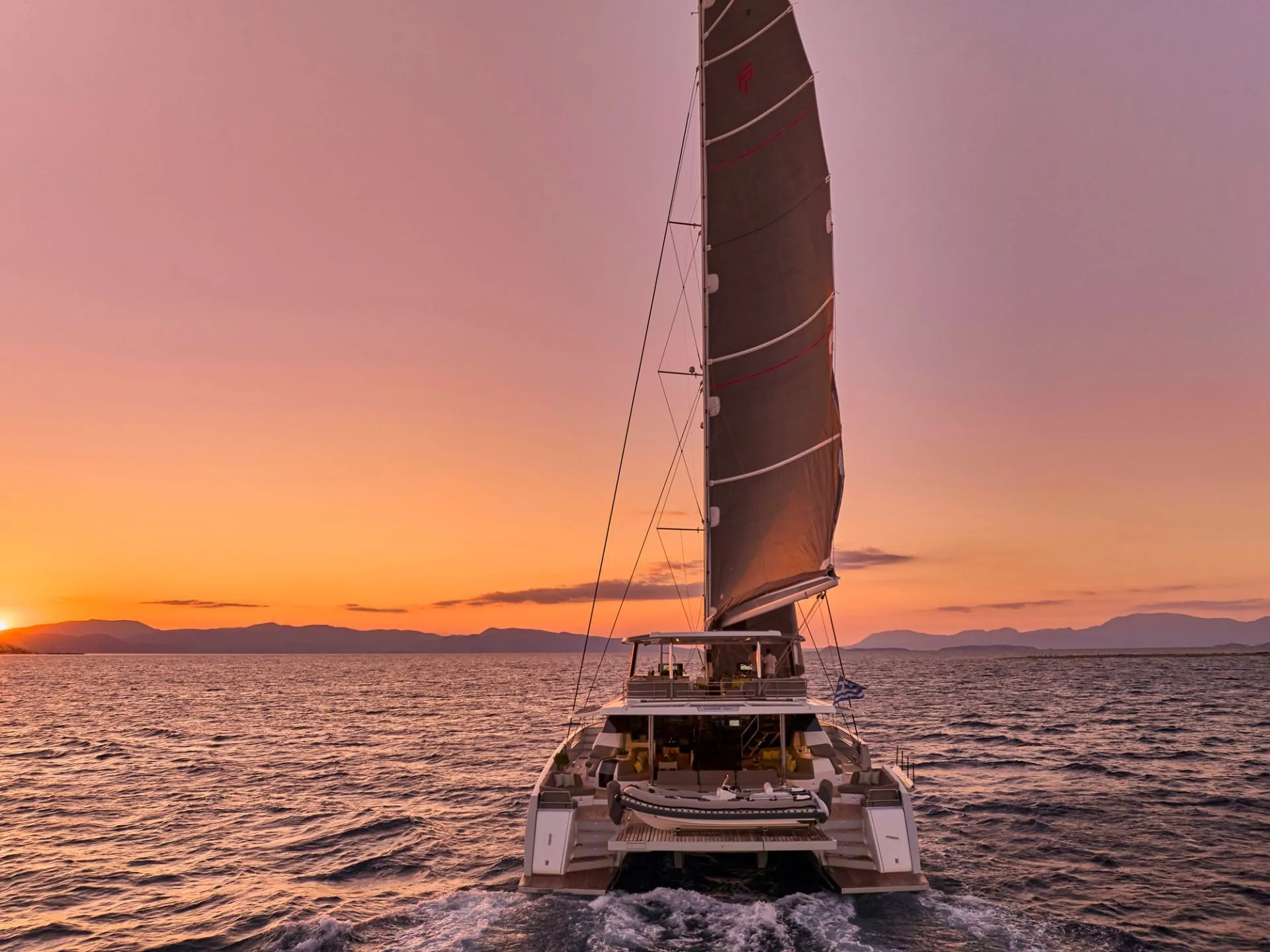 Thira 80 ALOIA 80 – Sailing at sunset